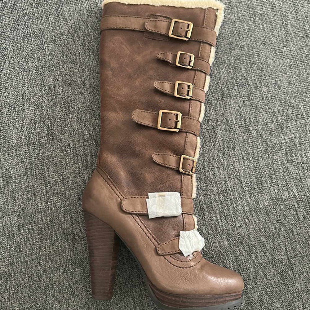 Report Knee High Boots
